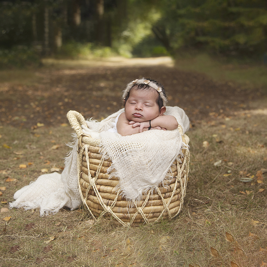 newborn baby outside in Essex countryside with newborn photographer